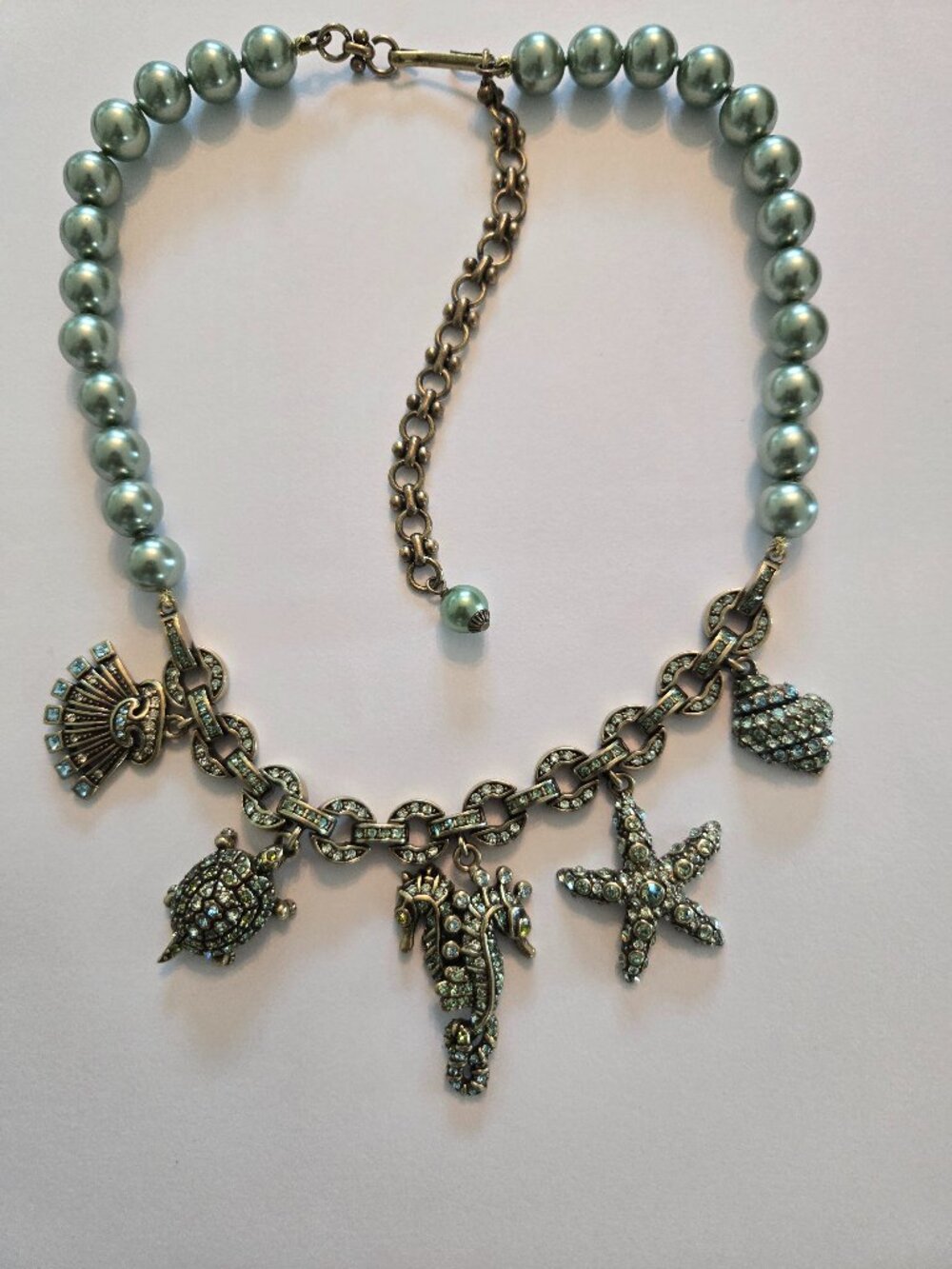 Heidi Daus pearl necklace with crystal sea creatures hanging from crystal chain